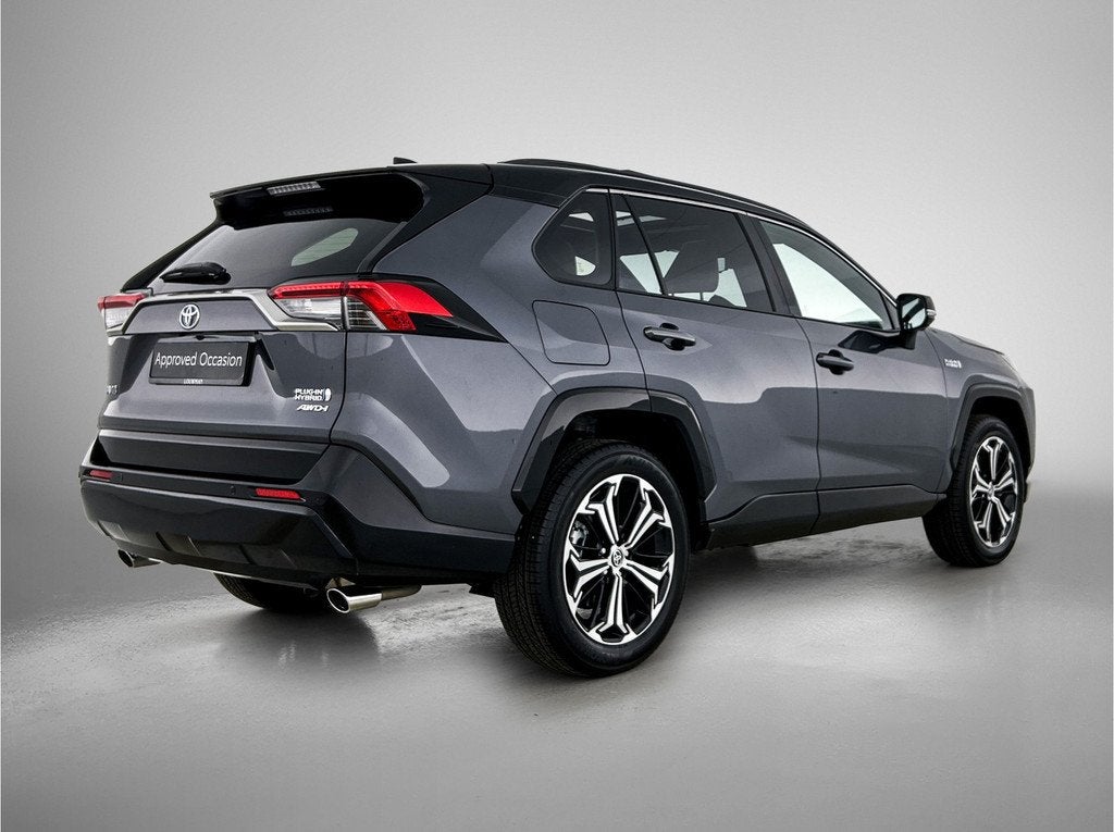 Toyota RAV4 2.5 Plug-in Hybrid AWD Bi-Tone Plus | Schuif/Kan, Auto's, Automaat, 12 maanden, Zwart, 4 cilinders