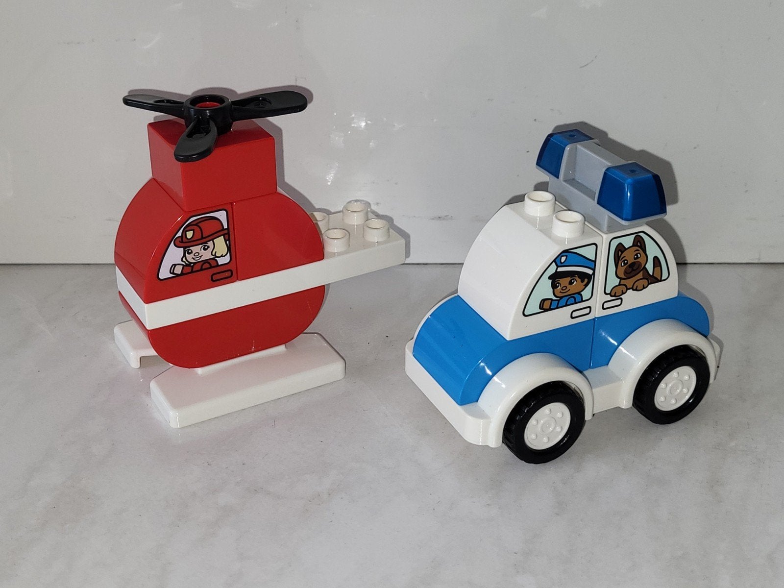 Duplo brandweer helikopter en politie auto, Gebruikt, Ophalen of Verzenden, Duplo, Duplo