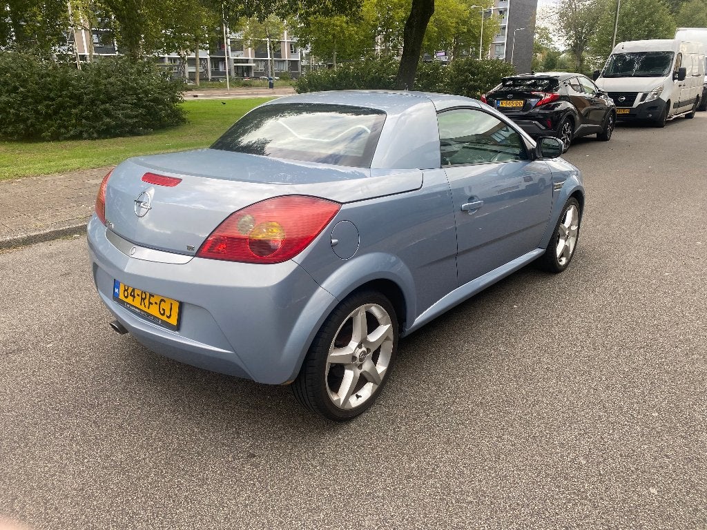 Foto 4 van Opel Tigra 1.8 16V SPORT Twintop2005 Leder Blauw Nieuwe APK