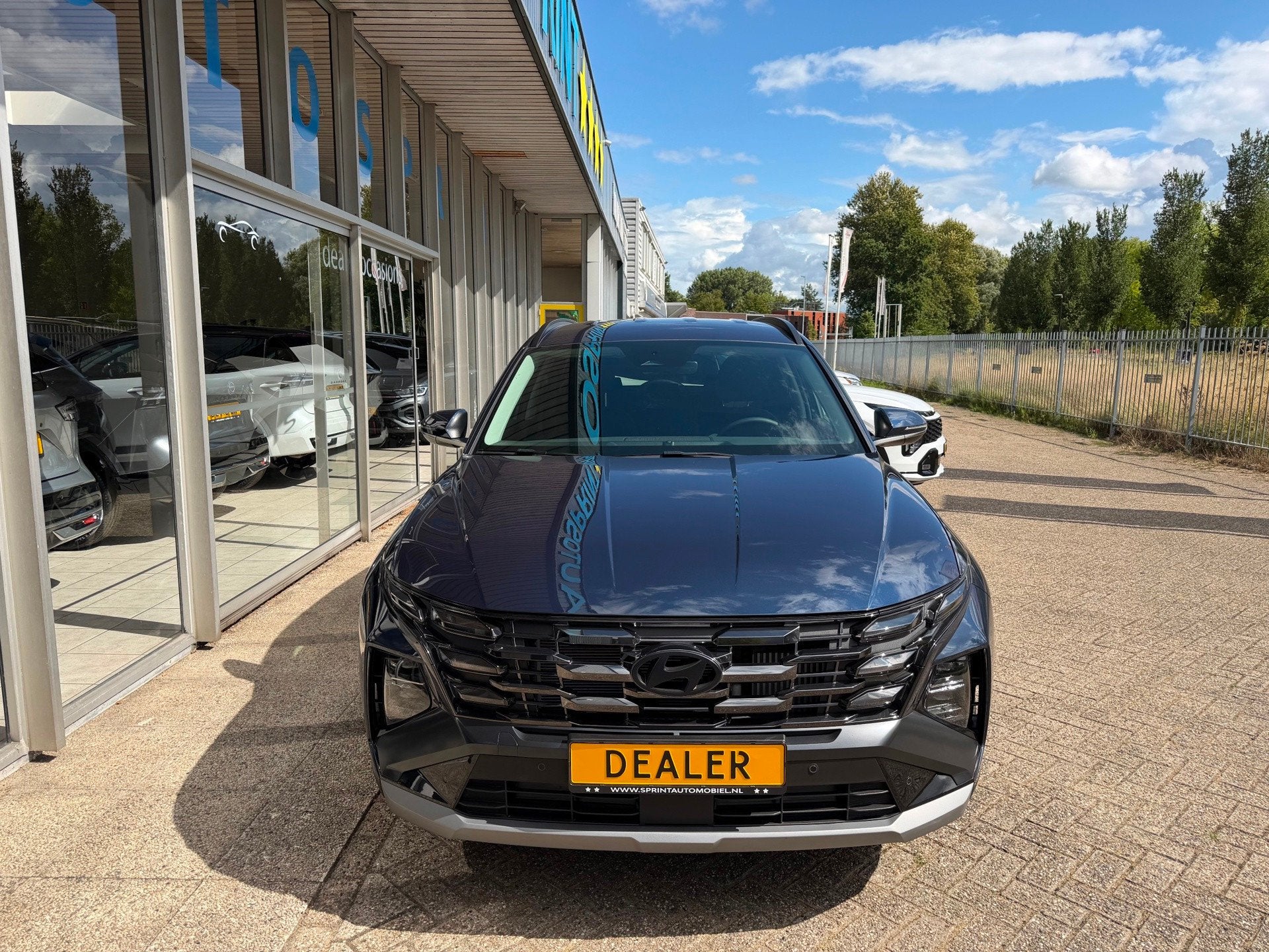 Hyundai Tucson 1.6 T-GDI MHEV Comfort 161PK , NAVIGATIE , CA, Auto's, Stof, Gebruikt, Zwart, 4 cilinders