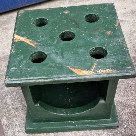 Groene houten houder met 5 gaten, Ophalen