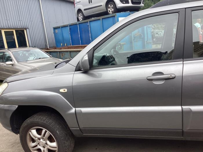 Portier 4Deurs links-voor van een Kia Sportage (S4), -, Deur, -, Ophalen of Verzenden