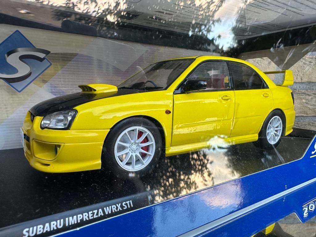 SOLIDO SUBARU IMPREZA WRX STI 2003 GEEL/ZWART 1:18 NIEUW, Hobby en Vrije tijd, Modelauto's | 1:18, Ophalen of Verzenden, Nieuw