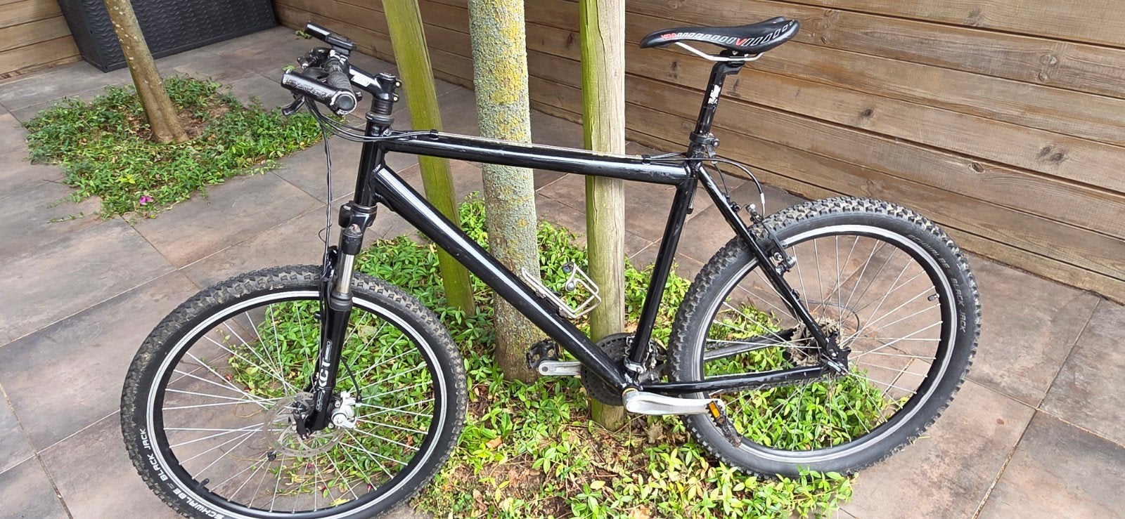 Zwarte Mountainbike met schijfrem en vering in voorwiel., Gebruikt, Heren, Schijfrem, 53 tot 57 cm