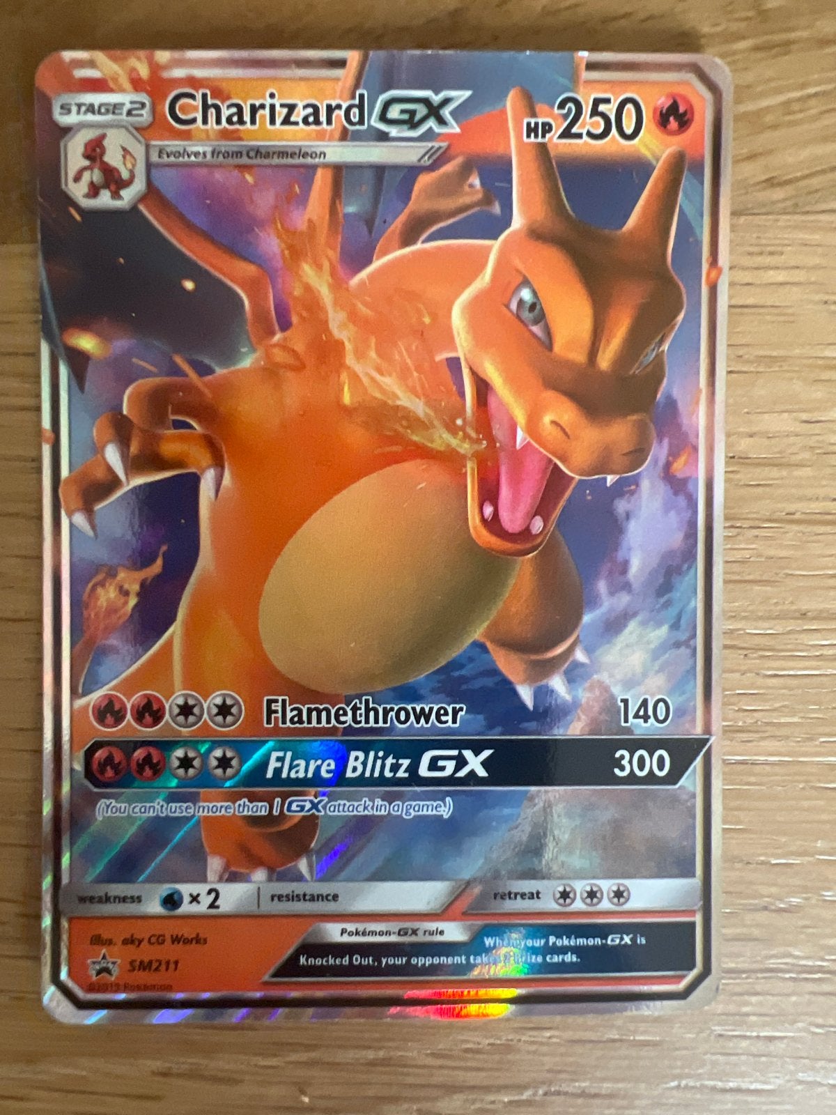 Pokémon Kaart Charizard GX SM211, Ophalen of Verzenden, Zo goed als nieuw, Losse kaart