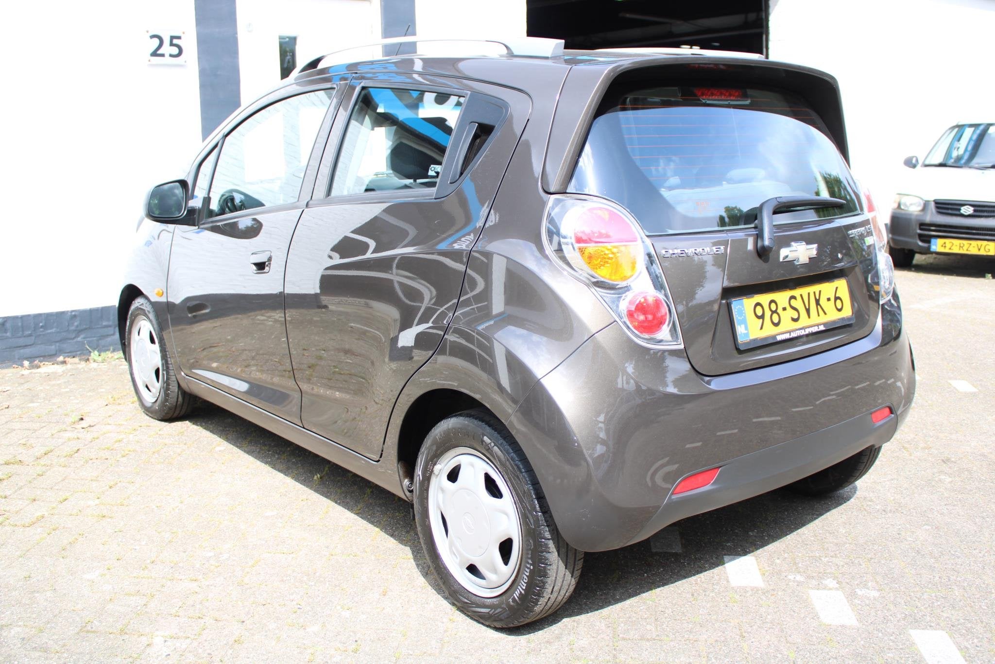 Chevrolet Spark 1.0 16V LS Bi-Fuel /Airco/5 Deuren/Nieuwe ap, Auto's, Euro 5, Stof, 4 cilinders, Bruin
