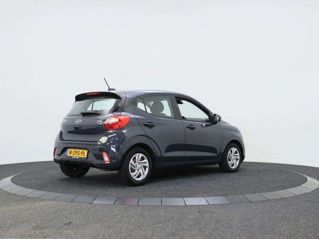 Hyundai i10 1.0 Comfort 5-zits | Carplay | Stoelverwarming |, 12 maanden, Stof, 23 km/l, Bedrijf