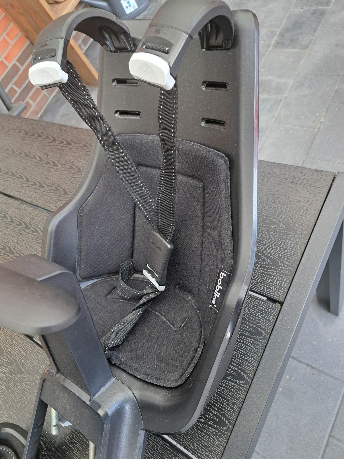 Bobike Exclusive Mini fietsstoeltje met windscherm, Ophalen, Voetsteuntjes, Voorzitje, Zo goed als nieuw