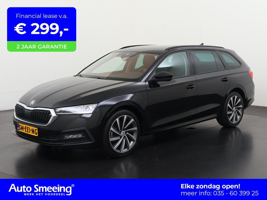 Skoda Octavia Combi 1.4 TSI iV PHEV Ambition | Stoel & Stuur, Auto's, Skoda, 12 maanden, Stof, Gebruikt, Euro 6