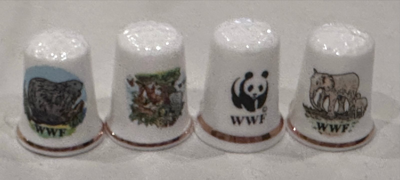 4 WWF Fine Bone China Porseleinen Vingerhoed Dierenmotieven, Ophalen of Verzenden, Zo goed als nieuw, Porselein