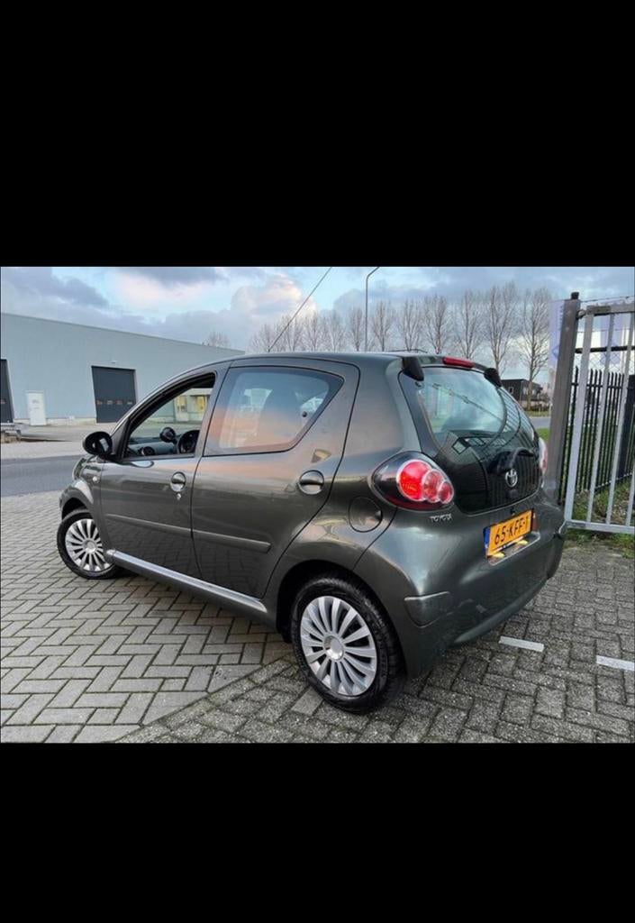 Toyota Aygo 1.0 12V Vvt-i 5DRS 2009 Groen, Auto's, Voorwielaandrijving, Zwart, 4 stoelen, 68 pk