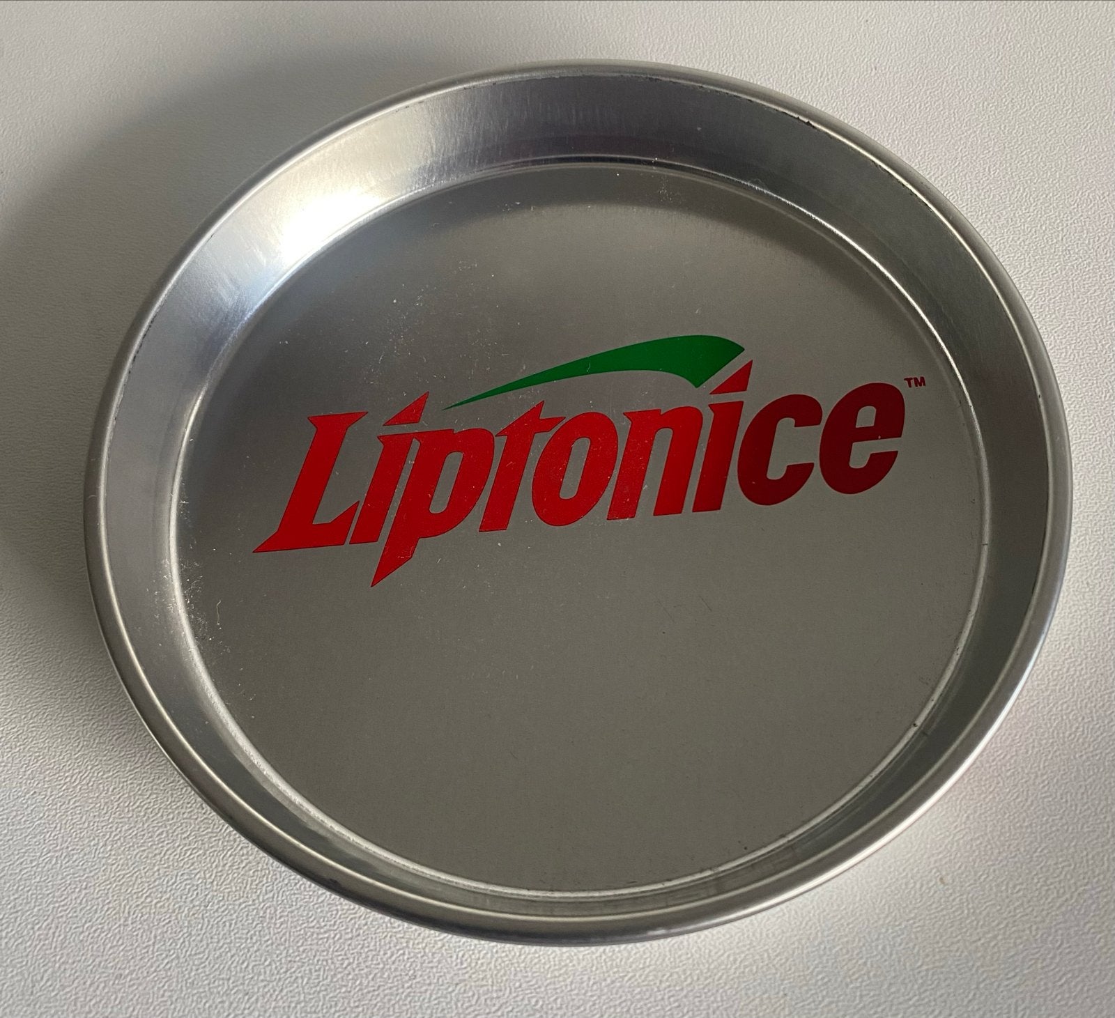 Onderzetter van Liptonice-licht metaal- Drsn. 12,5 cm., Verzamelen, Glas en Borrelglaasjes, Ophalen of Verzenden, Zo goed als nieuw