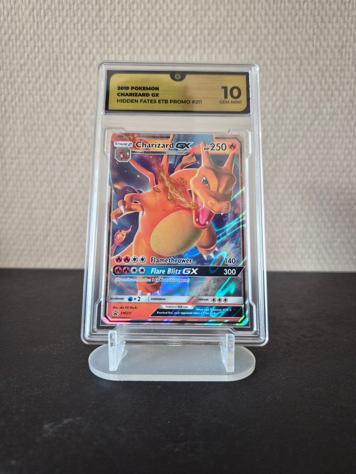 Charizard GX (SM211) Promo CGC 10 Gem Mint Hidden Fates, Hobby en Vrije tijd, Verzamelkaartspellen | Pokémon, Ophalen of Verzenden