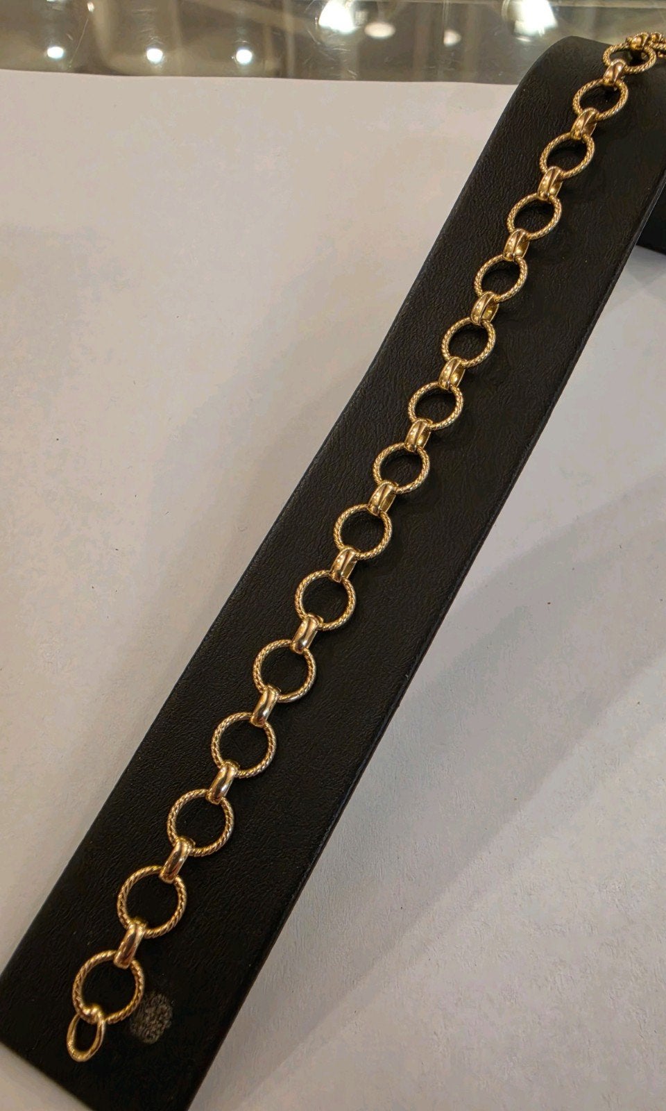 14 karaats gouden platte bewerkte rondjes armband geelgoud, Ophalen of Verzenden, Zo goed als nieuw, Goud, Goud
