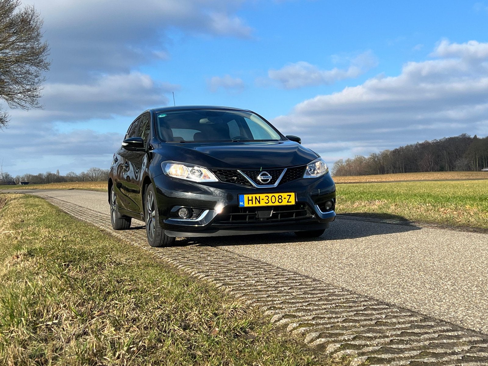 Nissan Pulsar 1.2 Dig-t 85KW Xtronic 2015 Zwart, Auto's, Nissan, Stof, 4 cilinders, Zwart, 1180 kg