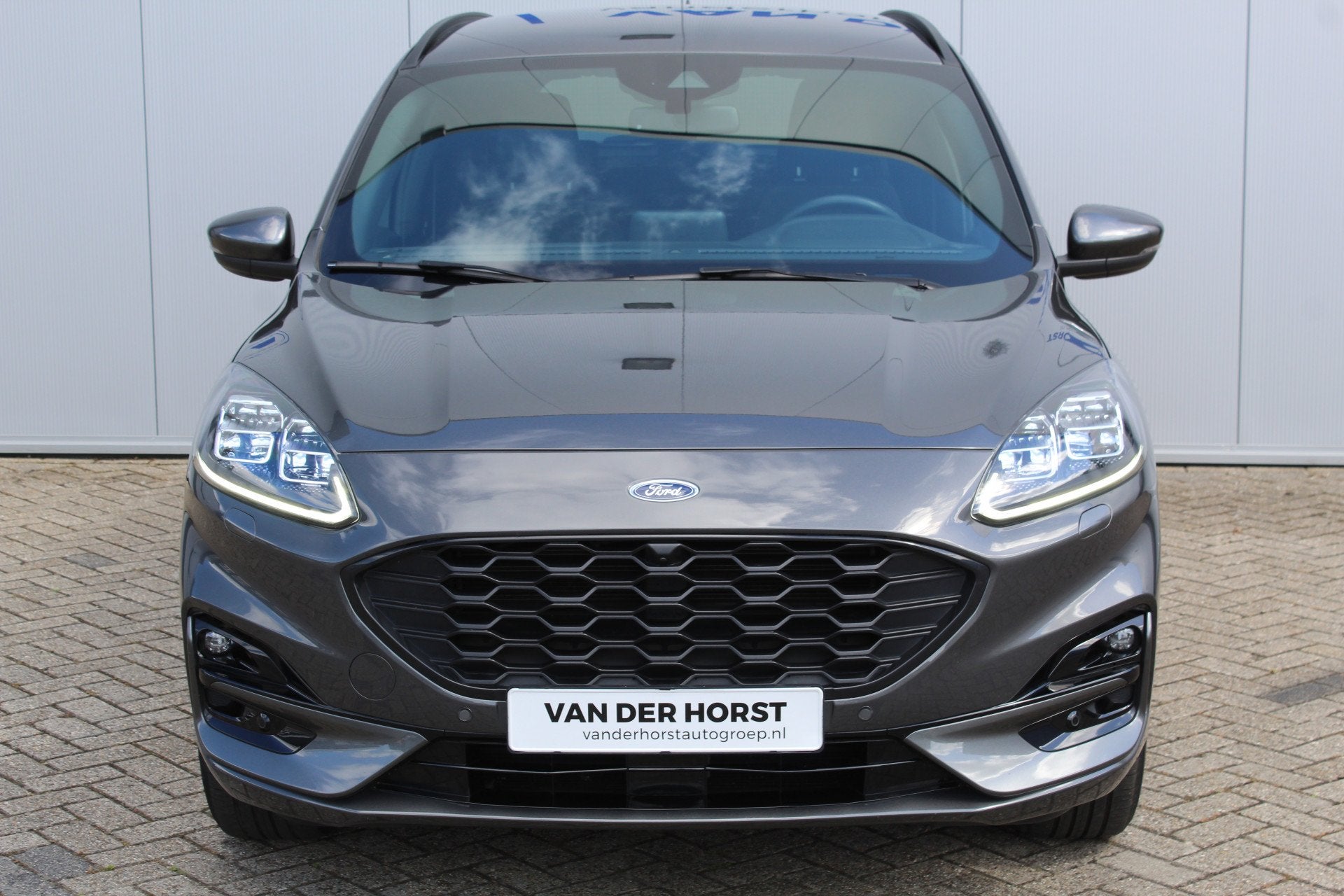 Ford Kuga 2.5-225pk Plug-in Hybrid ST-Line X. Hybride rijden, Gebruikt, Zwart, 4 cilinders, Leder en Stof
