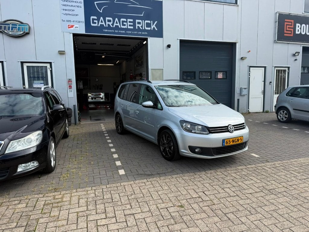 Volkswagen Touran 1.2 TSI Comfortline *NWE APK*NAVI*CLIMA*, Euro 5, Zwart, 4 cilinders, Origineel Nederlands