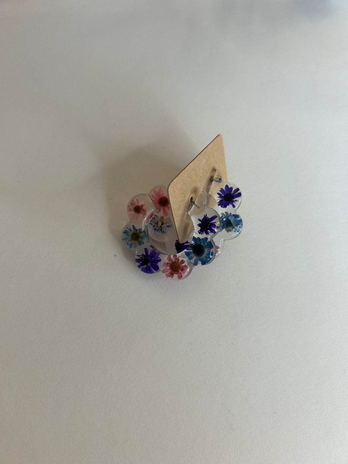 Doorzichtige bloemen oorbellen | Hema | als nieuw, Overige materialen, Hangers, Paars, Ophalen of Verzenden