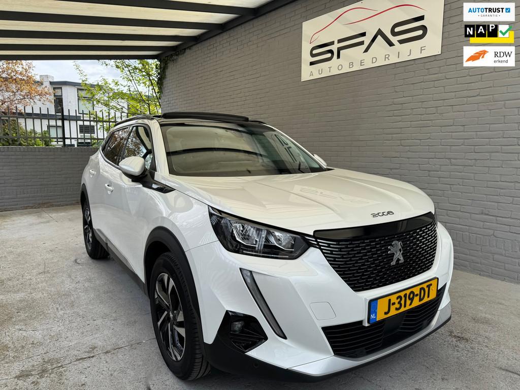 Peugeot 2008 1.2 PureTech 102pk 2020 Wit Pano, Auto's, Peugeot, Gebruikt, 1199 cc, Leder en Stof, Wit