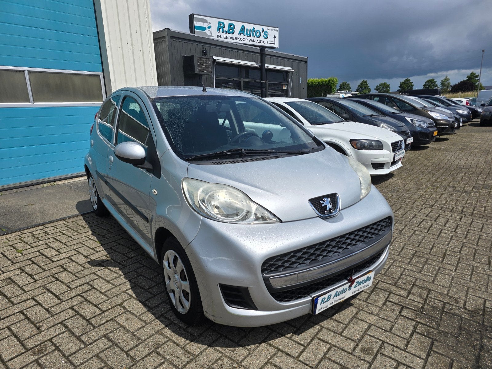 Peugeot 107 1.0 12V 5DR 2010 Grijs, Voorwielaandrijving, Stof, 4 stoelen, 68 pk
