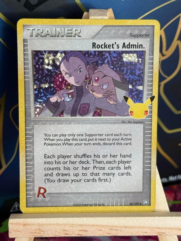Rocket's Admin. #86 | Pokemon Celebrations, Ophalen of Verzenden, Zo goed als nieuw, Losse kaart, Foil