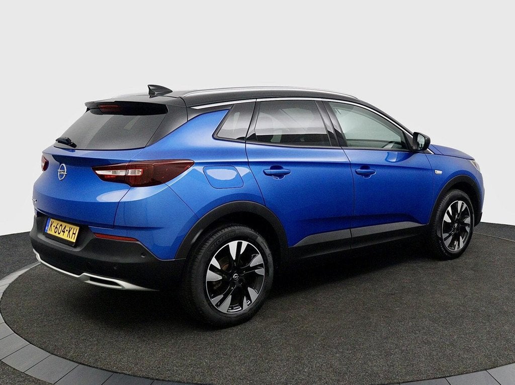 Opel Grandland X 1.2 Turbo Ultimate blauw automaat, Auto's, Opel, Gebruikt, 1199 cc, Met garantie (alle), Blauw