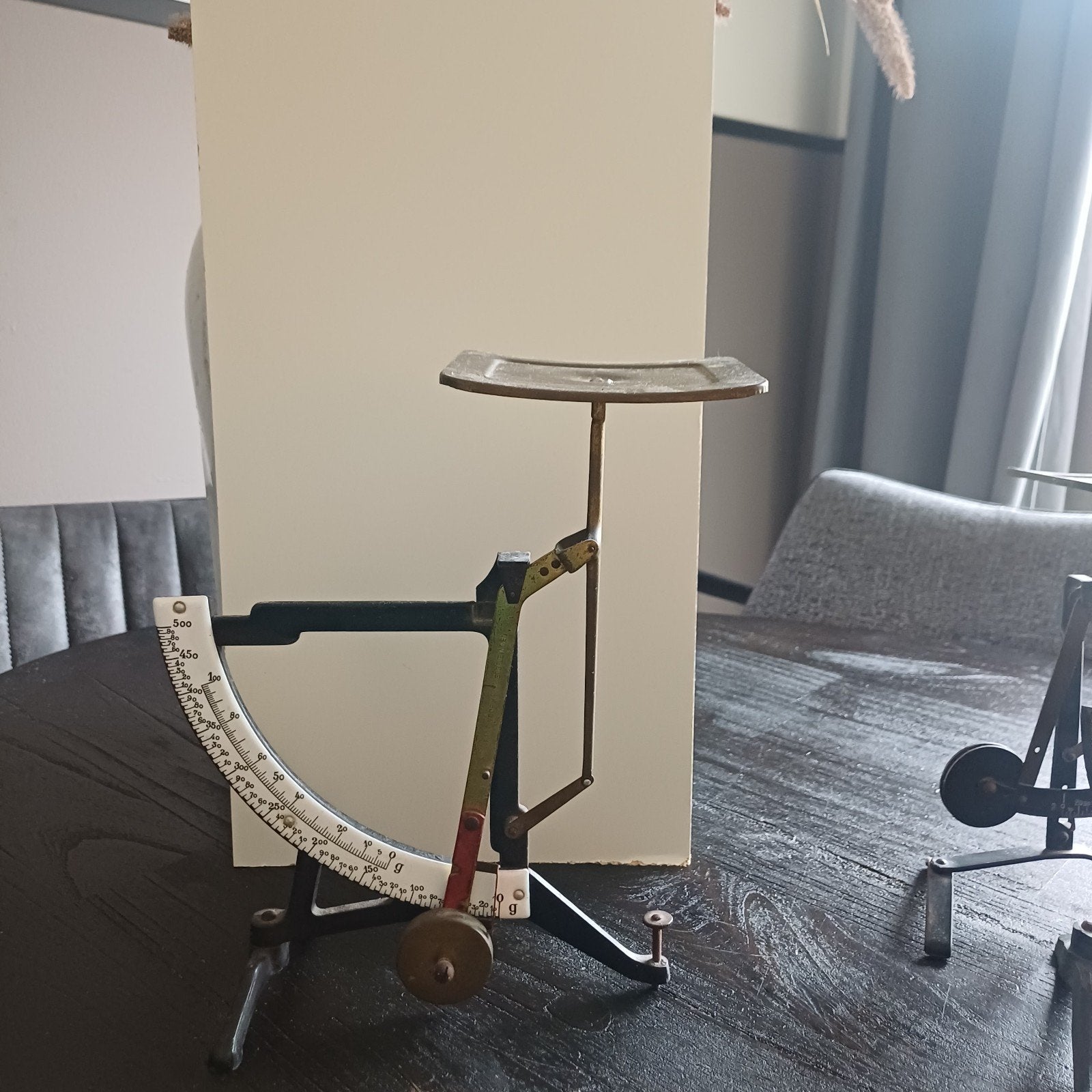 papierweegschaal, Ophalen