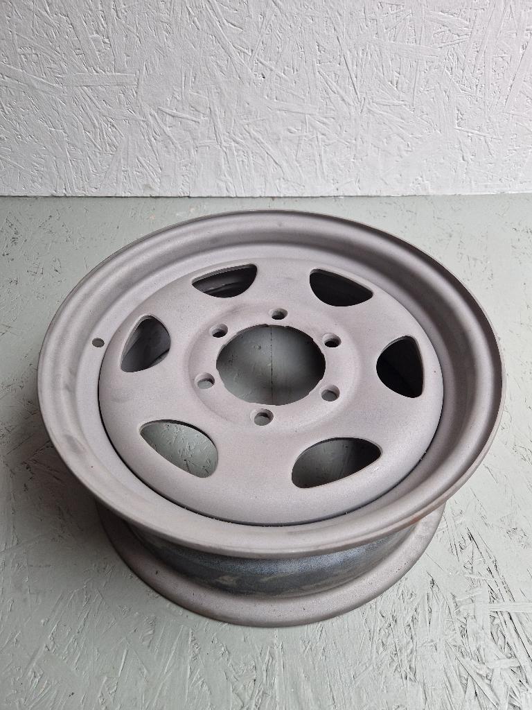 Stalen velg 15", Mitsubishi Pajero/L300 met Bridgestone band, Ophalen, Gebruikt, Mitsubishi