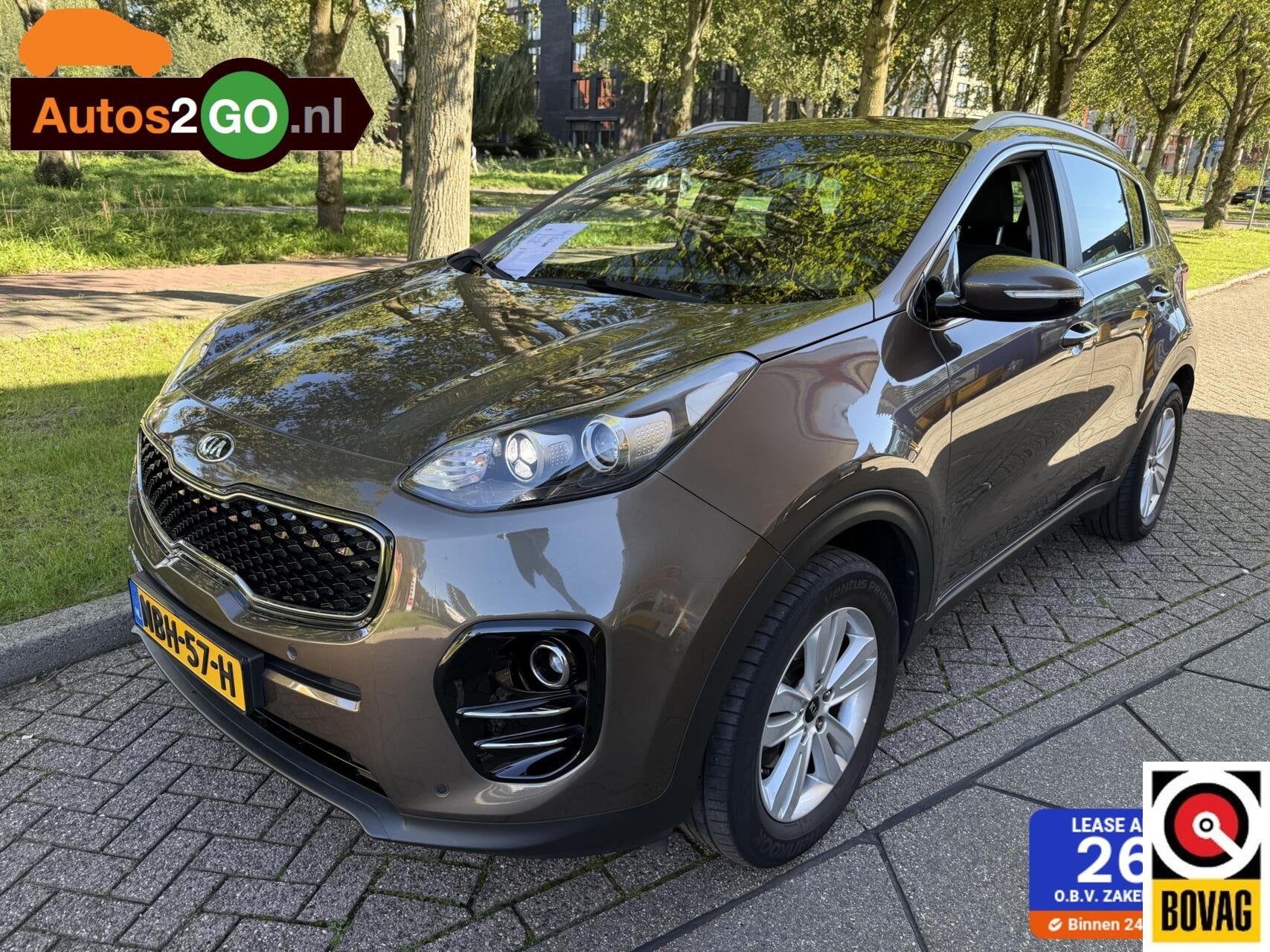Kia Sportage 1.6 GDI First Edition, Auto's, Gebruikt, 4 cilinders, Bruin, 132 pk