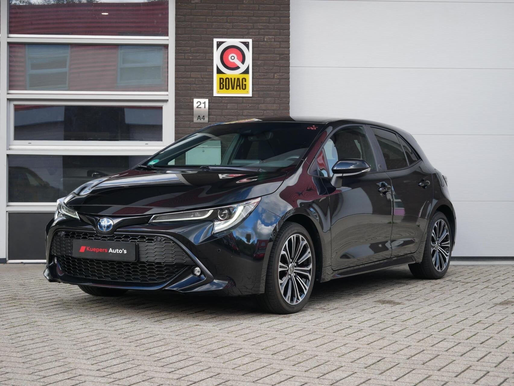 Toyota Corolla 2.0 Hybrid Team D GR Navi+BT| Camera| Dealer, Auto's, Toyota, Gebruikt, 4 cilinders, Corolla, Zwart
