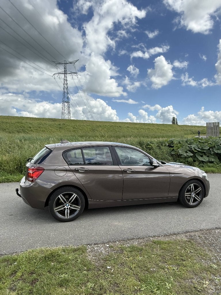 BMW 1-Serie 114d M Sport, Euro 5, Bruin, 23 km/l, Overige kleuren