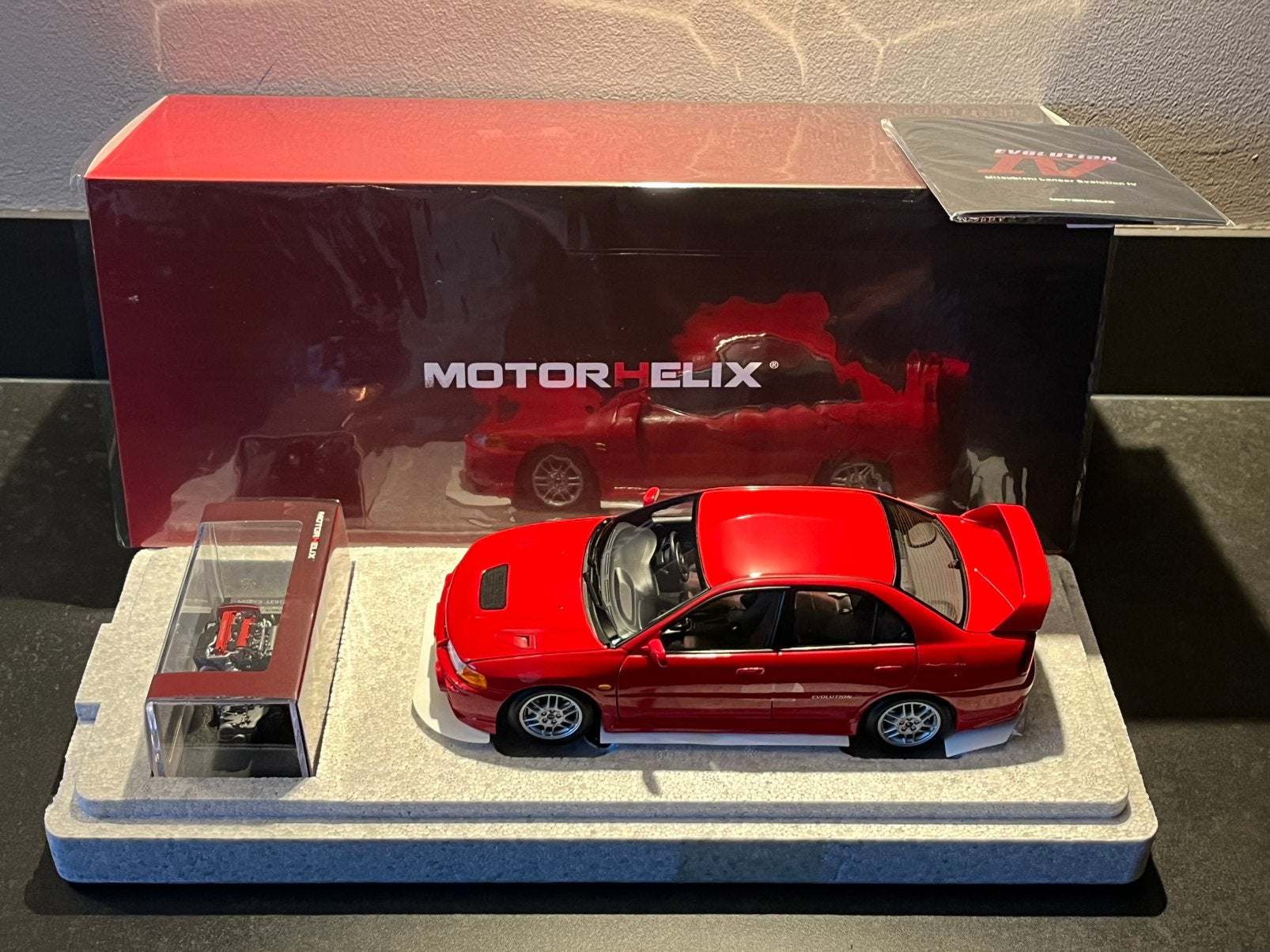 Motorhelix 1:18 Mitsubishi Lancer Evolution IV Palma Red, Hobby en Vrije tijd, Modelauto's | 1:18, Nieuw, Auto, Overige merken