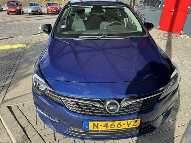 Opel Astra Sports Tourer 1.2 Bns Edition, Auto's, Stof, Gebruikt, Euro 6, 1199 cc
