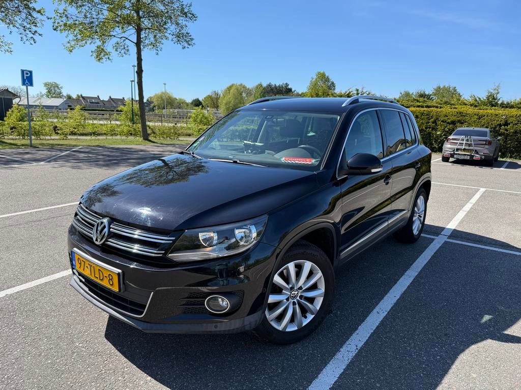 Heerlijke Volkswagen Tiguan 1.4 TSI uit 2012, Voorwielaandrijving, Zwart, 4 cilinders, Origineel Nederlands