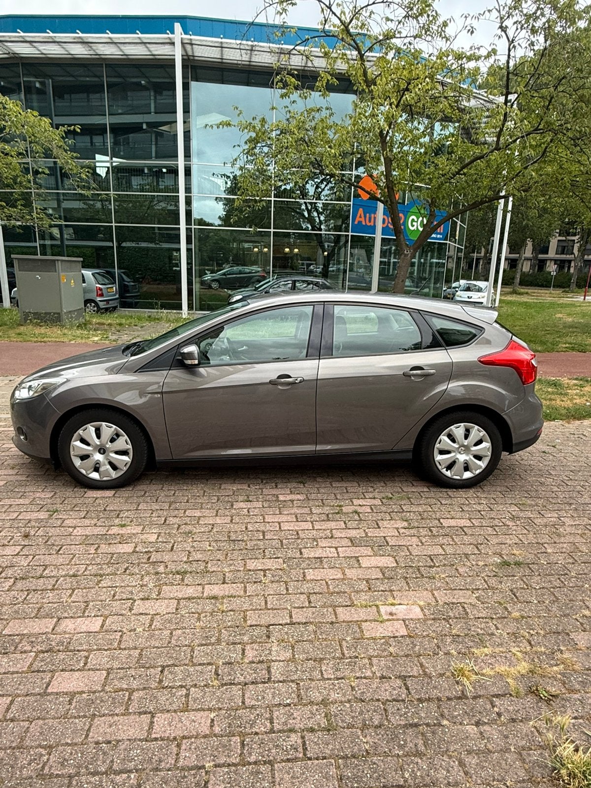 Ford Focus 1.0 Ecoboost 74KW 5-D 2012 Bruin, Auto's, Bruin, 635 kg, 100 pk, Bedrijf