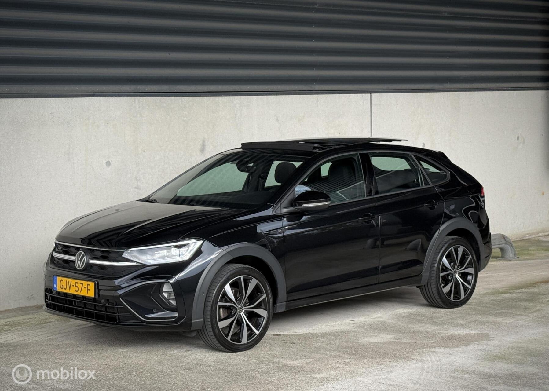 Volkswagen Taigo 1.0TSI R-Line|PANO|IQ|ACC|CARPLAY|, Auto's, Stof, Gebruikt, Euro 6, Zwart