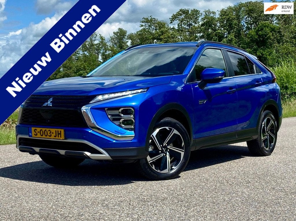Mitsubishi Eclipse Cross 2.4 PHEV Intense+ Automaat Camera L, Auto's, Mitsubishi, Automaat, 188 pk, 4 cilinders, Blauw