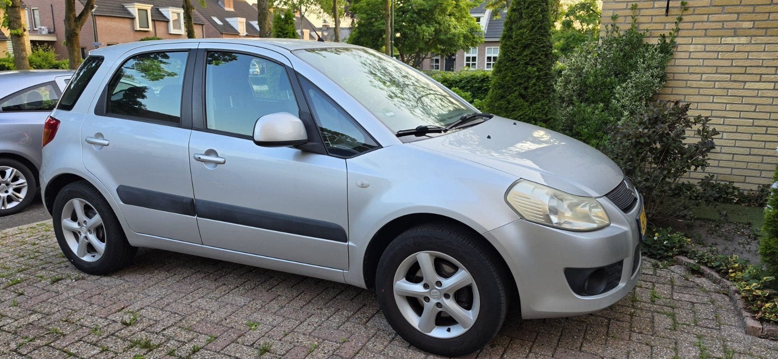 Suzuki SX4 1.6 2007 Grijs, Auto's, Suzuki, Voorwielaandrijving, Zwart, 4 cilinders, 49 €/maand