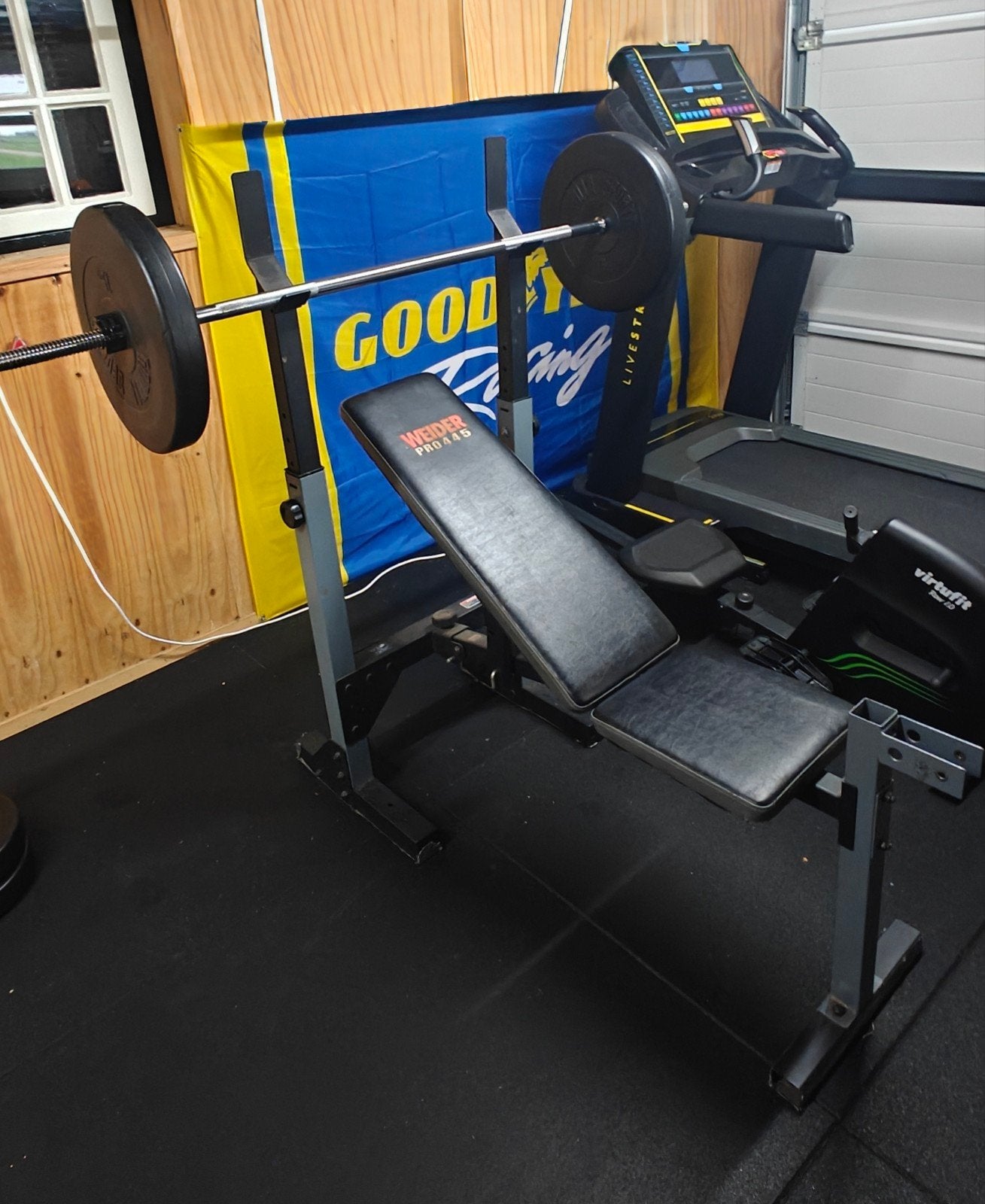 Halterset met curlstang, 75 kg gewichten en leg extension, Ophalen