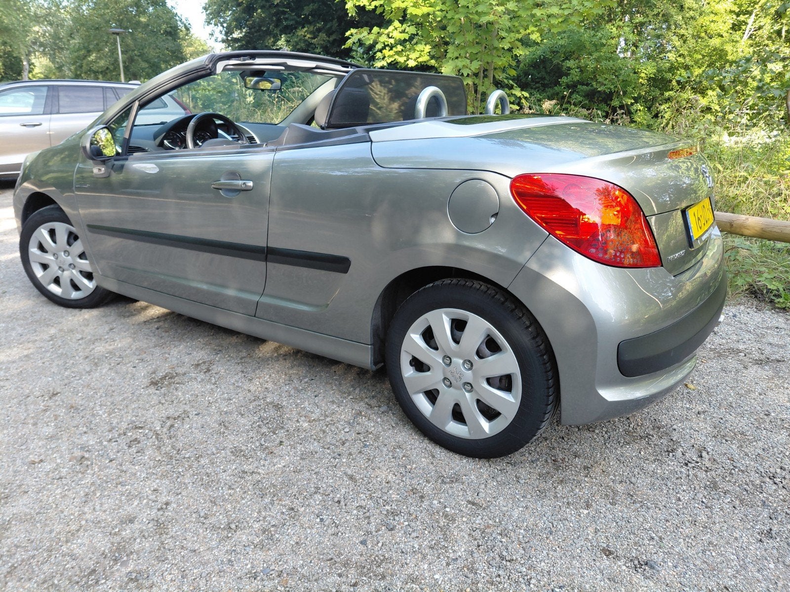 Peugeot 207 1.6 16V CC 88KW 2009 Grijs, Auto's, Voorwielaandrijving, 15 km/l, Lederen bekleding, Zwart