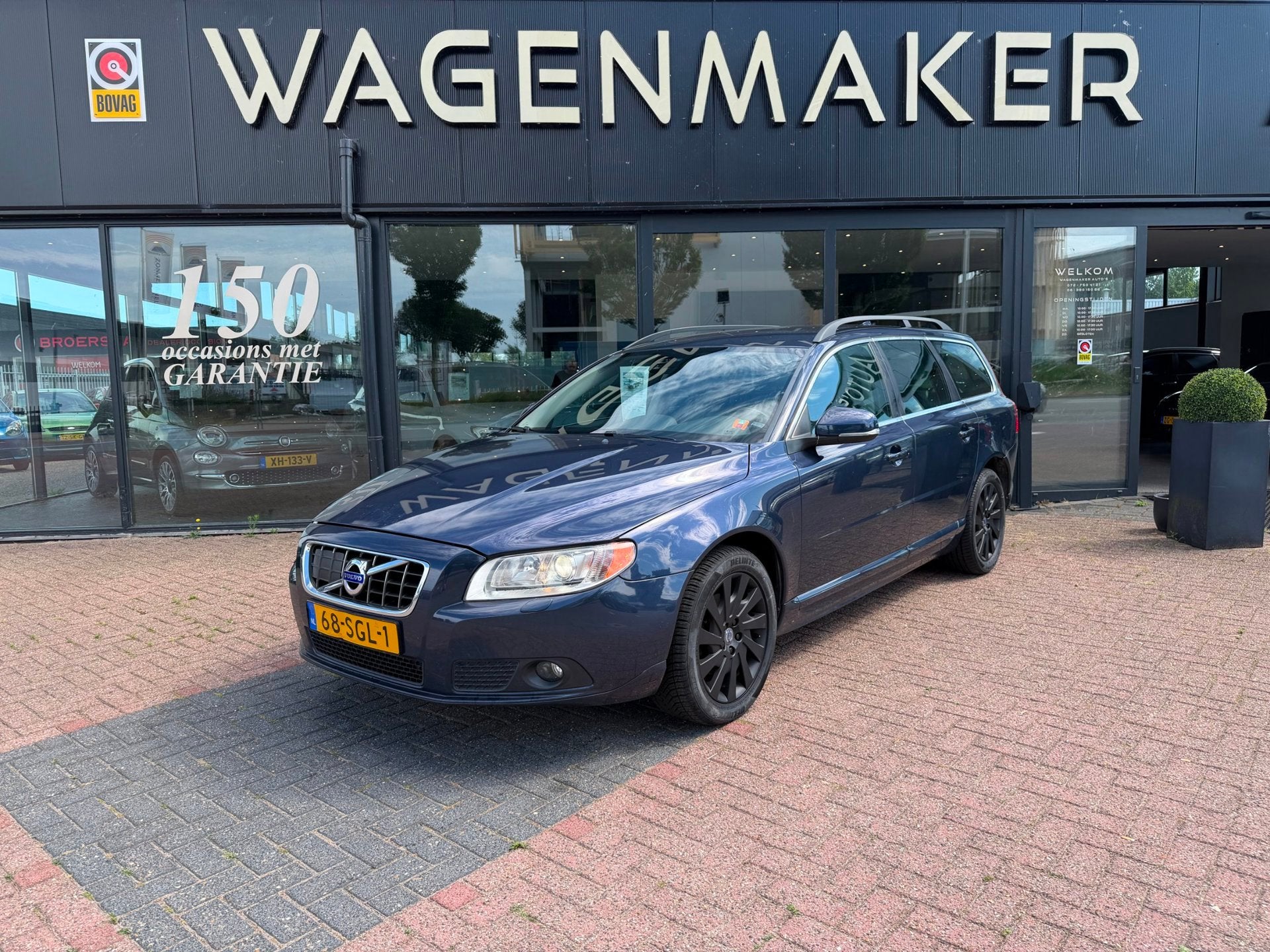 Volvo V70 1.6 T4 Limited Edition AUT|NAVI|Leder|HAAK|Goed OH, Gebruikt, Zwart, 4 cilinders, Blauw