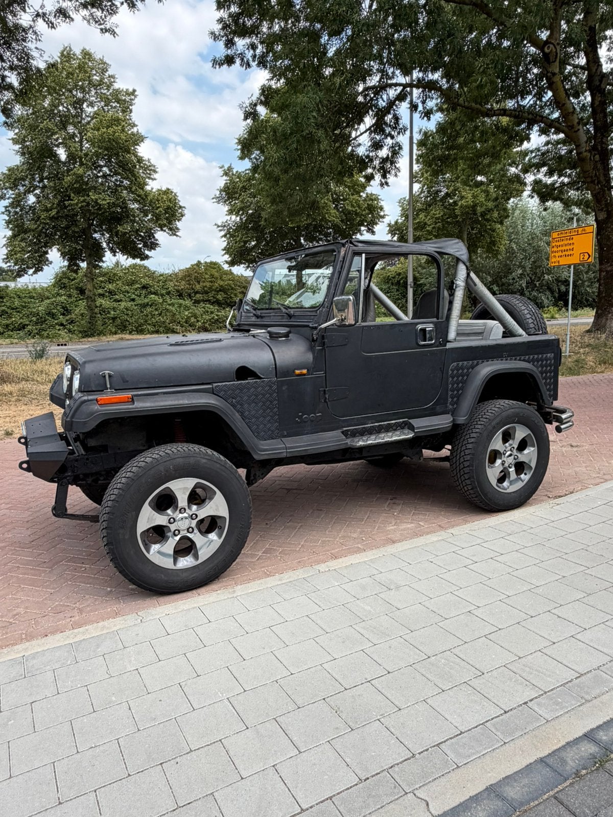 Jeep Wrangler 2.5 hardtop 4WD U9 1990 Zwart, Auto's, Jeep, Stof, 4 cilinders, 4 stoelen, Zwart