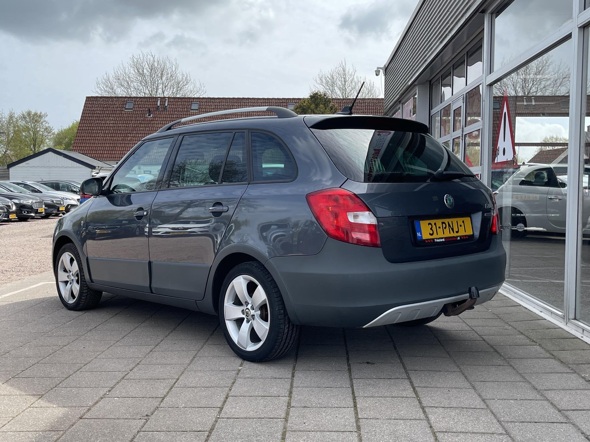 Skoda Fabia Combi 1.2 TSI Scout /Cruise/Navi/Trekhaak/Onderh, Voorwielaandrijving, Euro 5, 4 cilinders, Met garantie (alle)