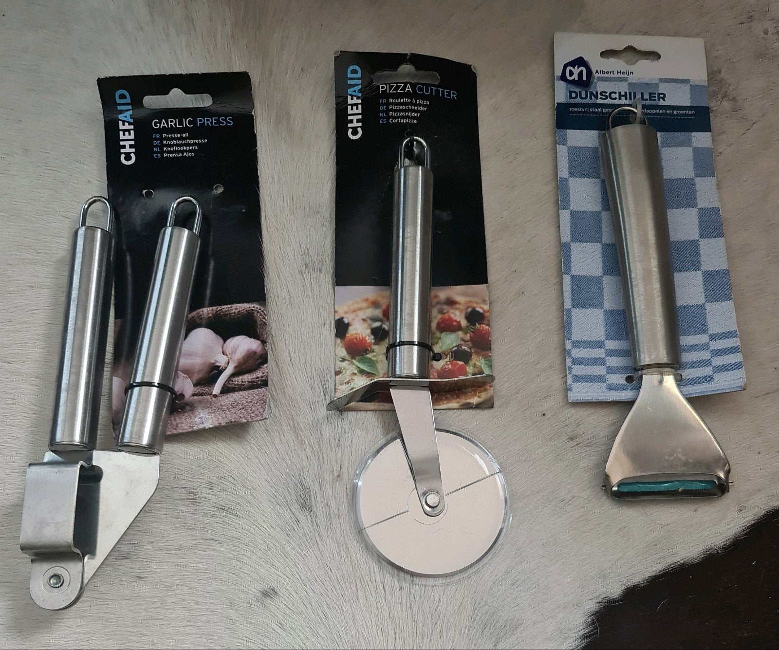 Nieuw Dunschiller, Pizzasnijder, Knoflookpers, Overige typen, Ophalen of Verzenden, Metaal, Overige merken
