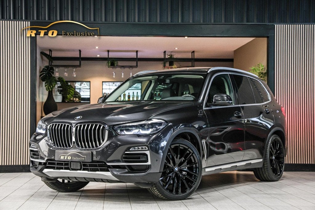 BMW X5 xDrive40i High Executive|Achterasbesturing|ACC|Pano, Auto's, BMW, Gebruikt, Met garantie (alle), 340 pk, Bedrijf