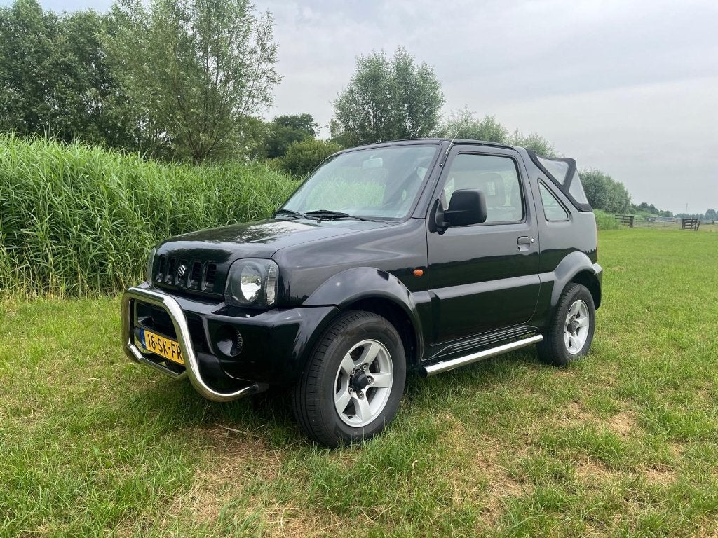 Suzuki Jimny 1.3 Cabrio 4WD 2006 Zwart, 13 km/l, Stof, 40 €/maand, 4 cilinders