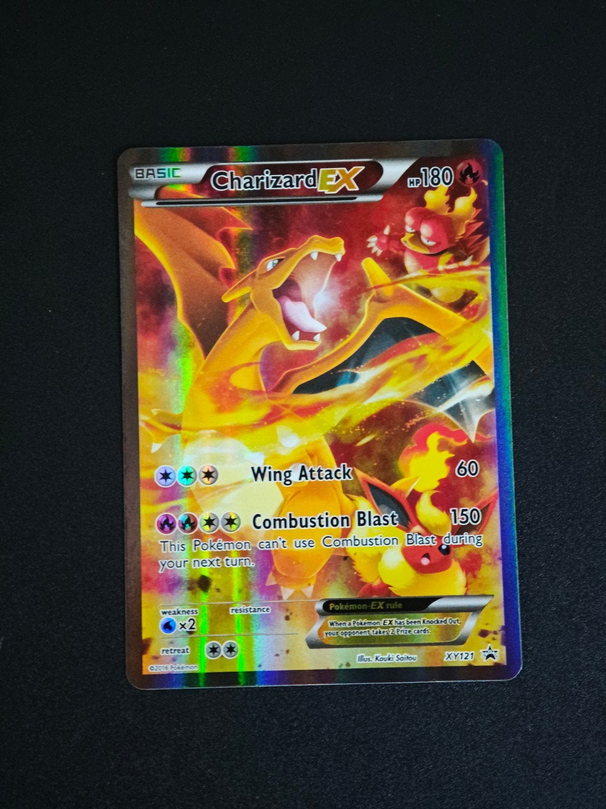 Charizard EX XY121 promo #2, Ophalen of Verzenden, Zo goed als nieuw