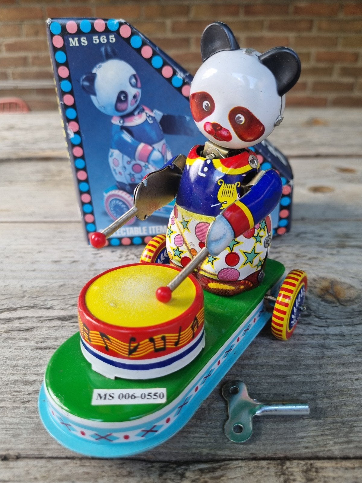 Oud blikken opwindbaar speelgoed: Panda met trommel, Antiek en Kunst, Antiek | Speelgoed, Ophalen of Verzenden