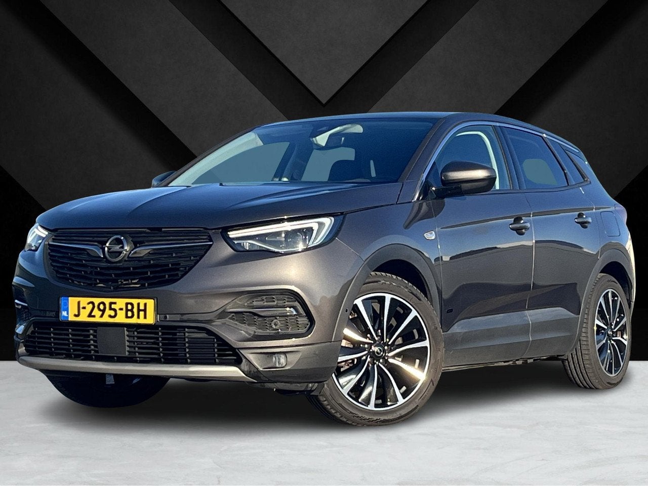 Opel Grandland X Innovation+ 1.6 PHEV 225pk Hybrid e-EAT8 |, Auto's, 4 cilinders, Bedrijf, Hybride Elektrisch/Benzine, 71 km/l