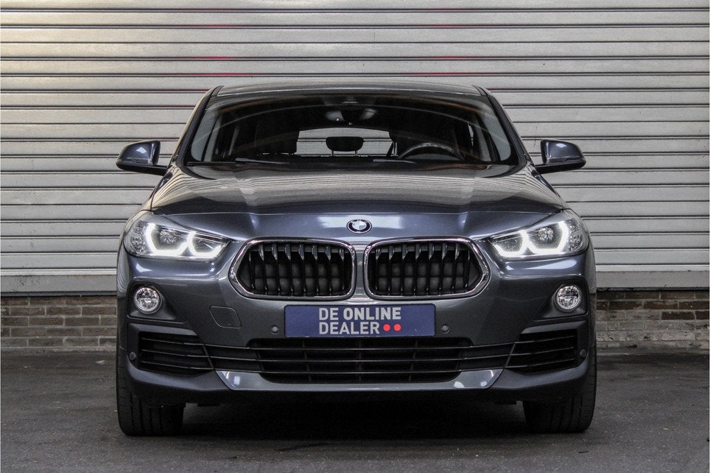 BMW X2 sDrive18i AUT Executive |19inch|Sfeer|Sportstoel|HUD, Auto's, BMW, X2, Euro 6, Leder, 3 cilinders